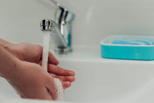 The Girl Washes Her Hands to Avoid Infection With the Virus COVID-19.