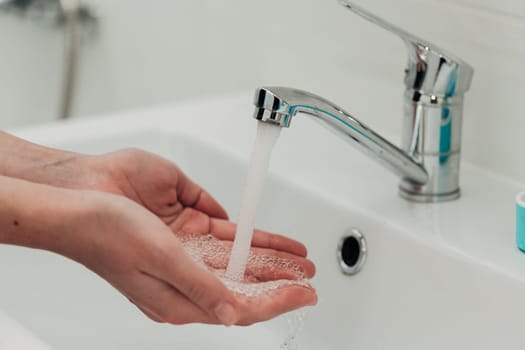 The Girl Washes Her Hands to Avoid Infection With the Virus COVID-19.