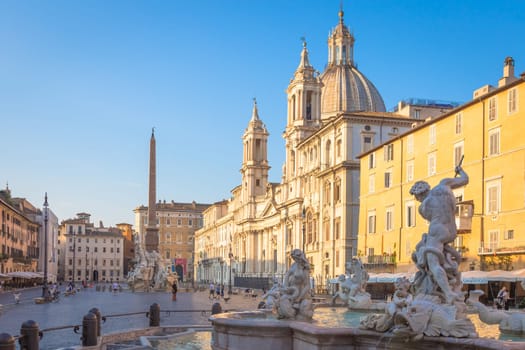 ROME, ITALY - CIRCA AUGUST 2020: Sunrise light on Piazza Navona (Navona Square) buildings