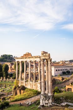ROME, ITALY - CIRCA AUGUST 2020: sunrise light with blue sky on Roman ancient architecture.