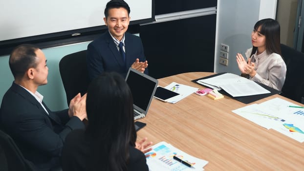 Business people team confident working and communicating together and were clapping applauding their hands success happy and smiling in meeting room at office, Agreement business concept