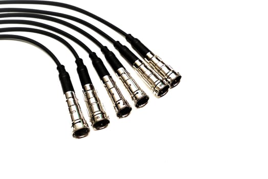 Six new ignition cables isolated on a white background