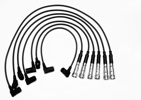 Six new ignition cables isolated on a white background