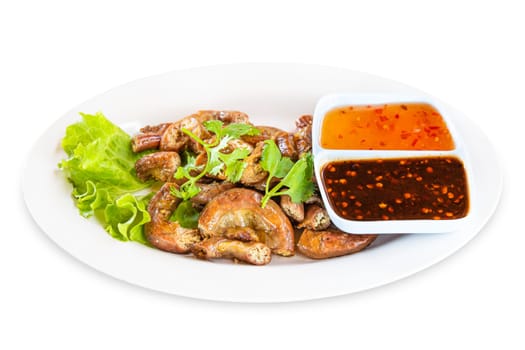Pig's intestines grilled with sauce thai style food in dish on white background