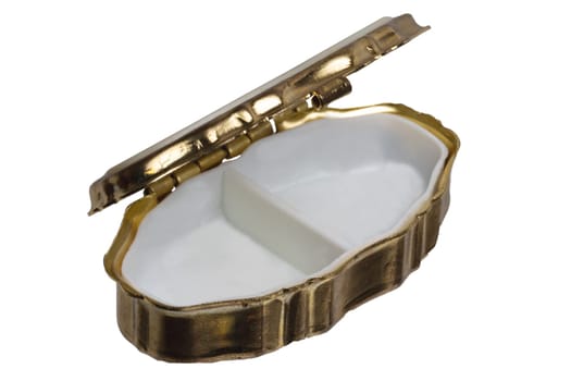 Closeup of a empty opened old gold casket for jewellery bracelets and luxury accessories isolated on a white background. Macro.
