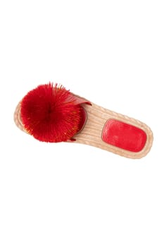 Womens boots and shoes. Top view of a single women slipper with red pompoms isolated on a white background. Fashion of sandals.