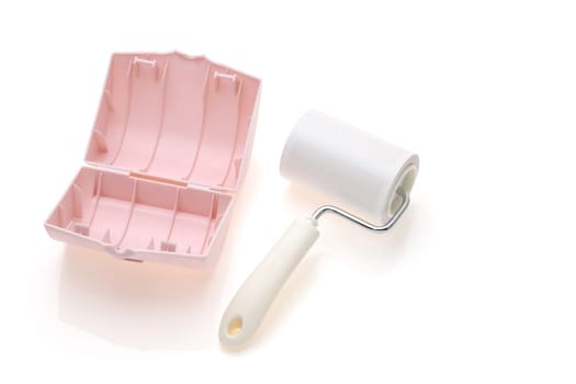 sticky roller cleaning, housework and housekeeping concept