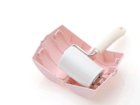 sticky roller cleaning, housework and housekeeping concept