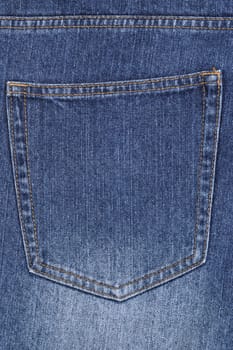 blue jeans with back pocket as background, closeup