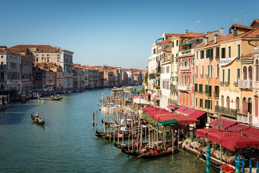 Gondolier Heads into the Sunset Along Venice's Grand Canal