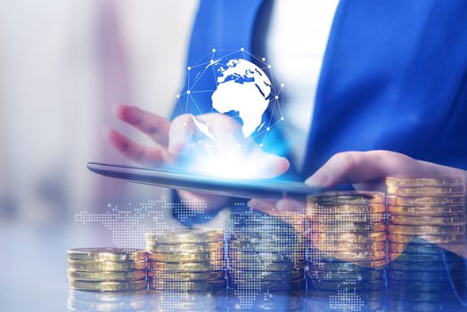 Double exposure, Technology network and online banking and internet banking and networking people concept, Business women with laptop, phone, cellphone, tablet, smartphone mobile, and coin money on business office table
