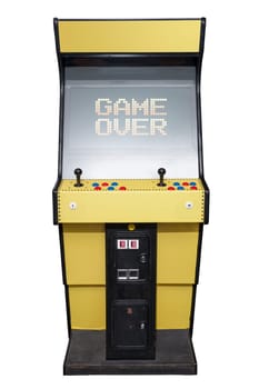 Vintage video game with Game Over screen isolated on white