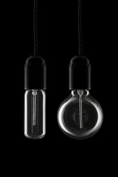 Two different vintage lightbulbs turned off