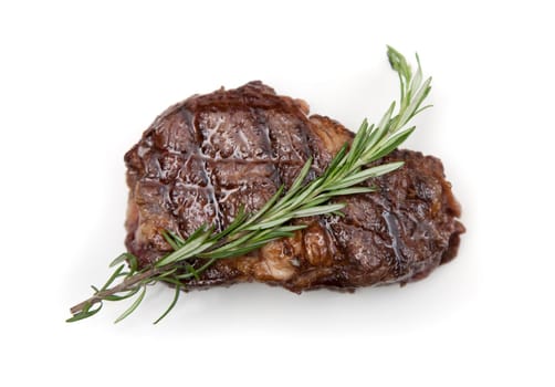 Juicy ribeye steak on white background