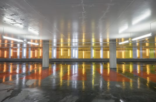 Indoor car park with empty parking lots.