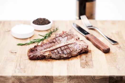 Juicy t-bone steak fresh of the grill - selective focus