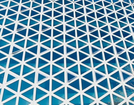 detail of a modern building facade with triangle shaped windows
