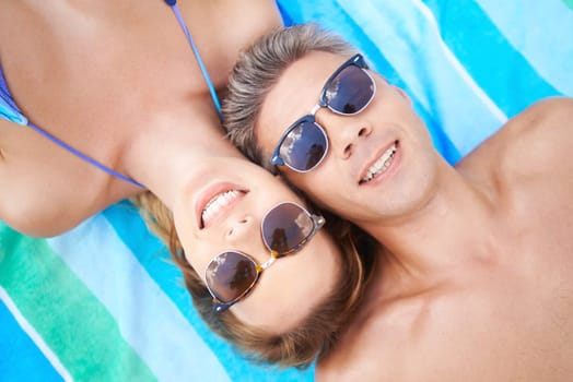 Attractive couple in eyeglasses enjoying summer vacations