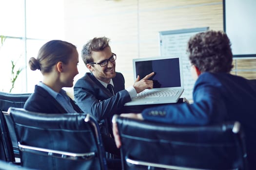 Young businessman making presentation of his ideas upon project