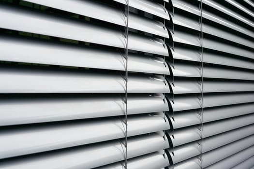 Blinds as sun protection on the window of an office building in Berlin in germany