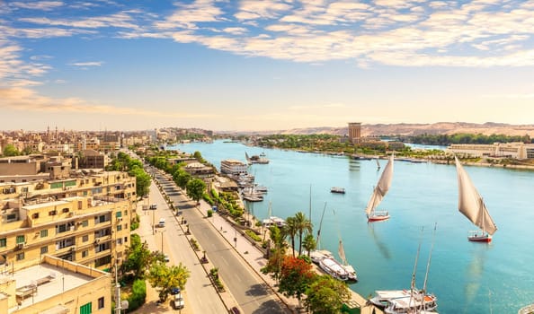 Panorama of Aswan and the Nile with sailboats, aerial view, Egypt.