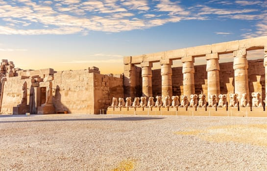 Sphinx statues and the main entrance of Karnak temple, Luxor, Egypt.