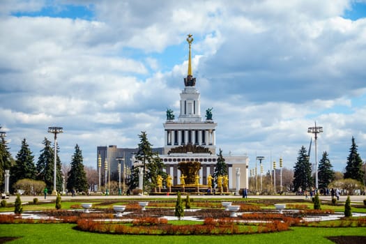 Moscow, Russia, April 23, 2016: Central Pavilion and the Friendship of Nations fountain at the Exhibition of Achievements of National Economy in Moscow, Russia