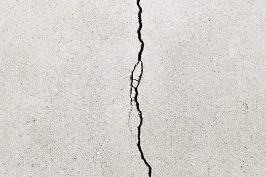 Gray cracked building wall texture for background, copy space
