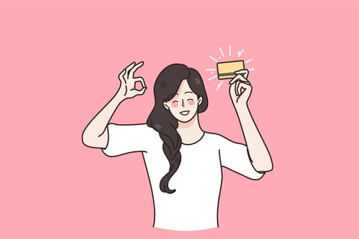 Financial stability and credit card concept. Young smiling asian woman holding golden credit card in raised hand showing ok sign gesture with hand vector illustration
