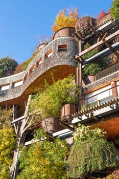 Turin, Italy - Circa November 2021: real estate green residential building. Exterior with modern design, plants and wood integrated. This Treehouse Suite is named 25 Verde