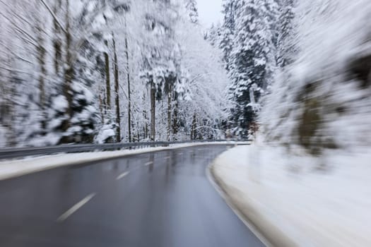 slippery road in winter in the black forest