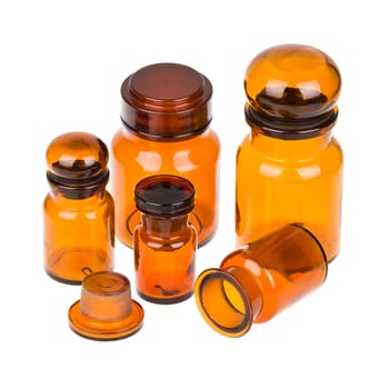 Set of vintage brown apothecary bottles isolated on white background