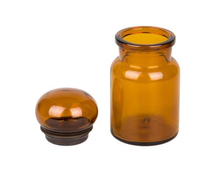 Empty vintage apothecary bottle with open lid isolated on white background