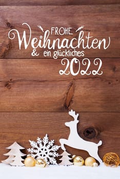 German Calligraphy Frohe Weihnachten Und Ein Glueckliches 2020 Means Merry Christmas And Happy 2020. Christmas Decoration With Tree, Deer And Golden Ball. Brown Wooden Background