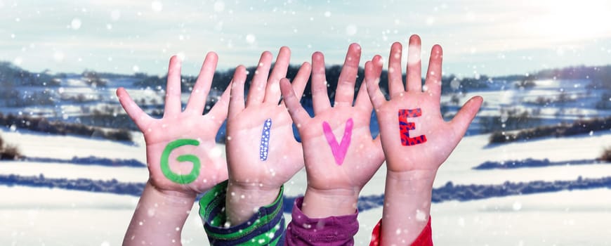 Children Hands Building Colorful Word Give. Snowy Winter Background With Snowflakes
