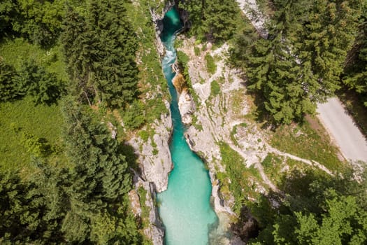 Aerial drone view of magical turquoise color of Soca river, Slovenia.