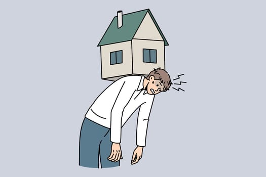Exhausted young man carry house on back suffer from bank mortgage or lease burden. Tired male struggle with financial payment, home expenses, bills and taxes. Flat vector illustration.