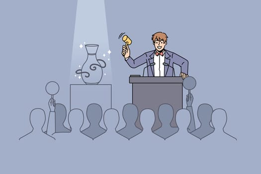 Male seller with gavel sell sculpture on auction to audience. Man auctioneer lead public buying event, people buyers raise hands make bids. Art gallery and antique concept. Vector illustration.