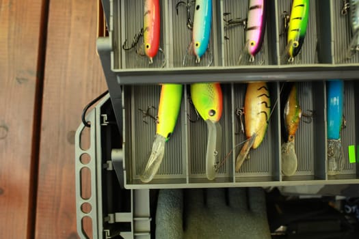 open fishing box with wobblers close-up