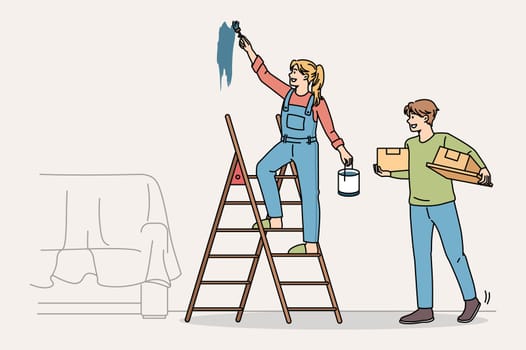 Happy couple do home renovation or decoration together. Smiling man and woman paint walls decorate repair house or apartment. Interior design concept. Vector illustration, cartoon character.