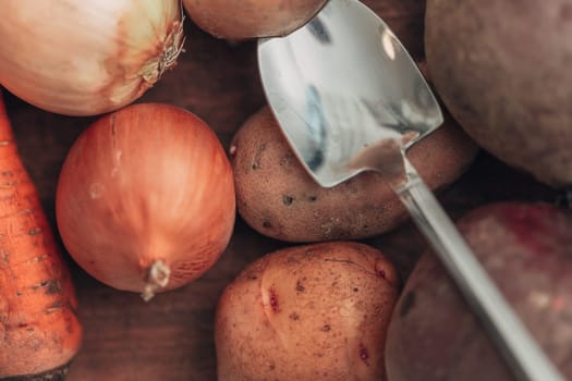 Fresh and Bright Vegetables Lie on the Kitchen Table.