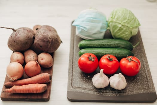 Fresh and Bright Vegetables Lie on the Kitchen Table.