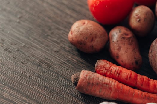 Fresh and Bright Vegetables Lie on the Kitchen Table. Copy Space