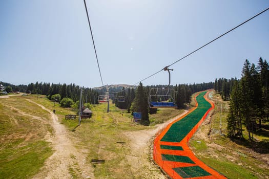 Chair lift , summer panoramic sightseeing, beautiful view of mountain Kopaonik, Serbia.
