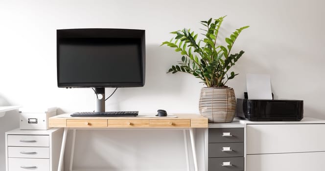 Illustrated view of the modern workplace in white room. Mockup of the workspace with wooden table and computer on it, with plant and scanner on the shelve.