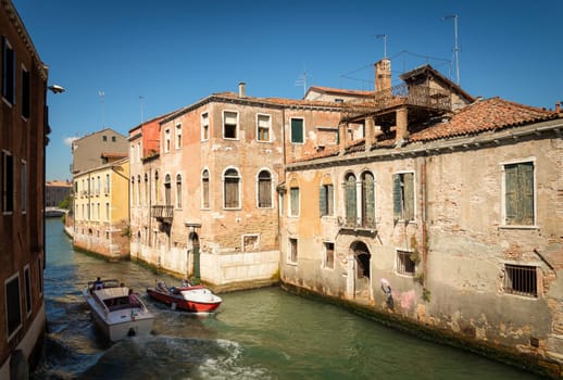 Motorboats at a canal in Venice