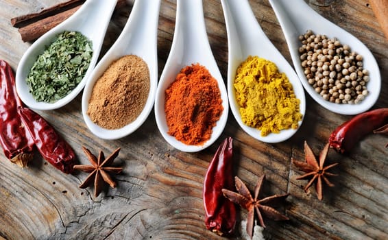 Various of spices on rustick wooden table