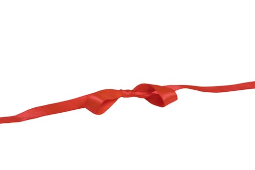 Gift bows. Closeup of a decorative red ribbon bow made of silk for gift box isolated on a white background. Decorations background. Macro photograph.