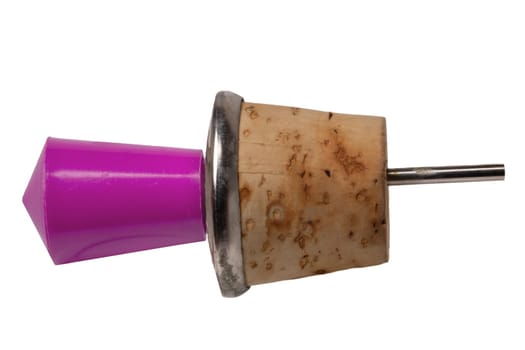 Kitchen, cooking and bar accessories. Close-up of a bottle pourer or cork pourer for oil, spirits, wine, vinegar or liqueur isolated on a white background. Macro.