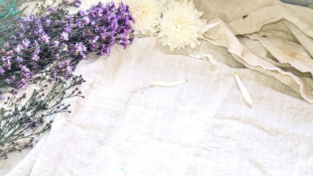 Vintage style decorate with white flowers. Idea background. Eco design with vintage elements linen fabric. Copy space